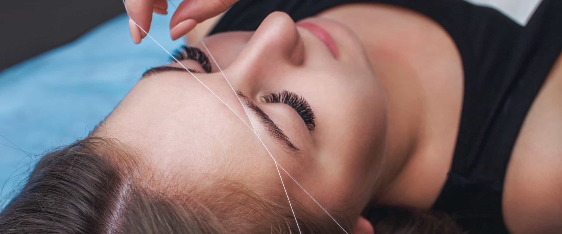 What is the Average Cost of Eyebrow Threading Services at a Barber Shop in Washington DC?